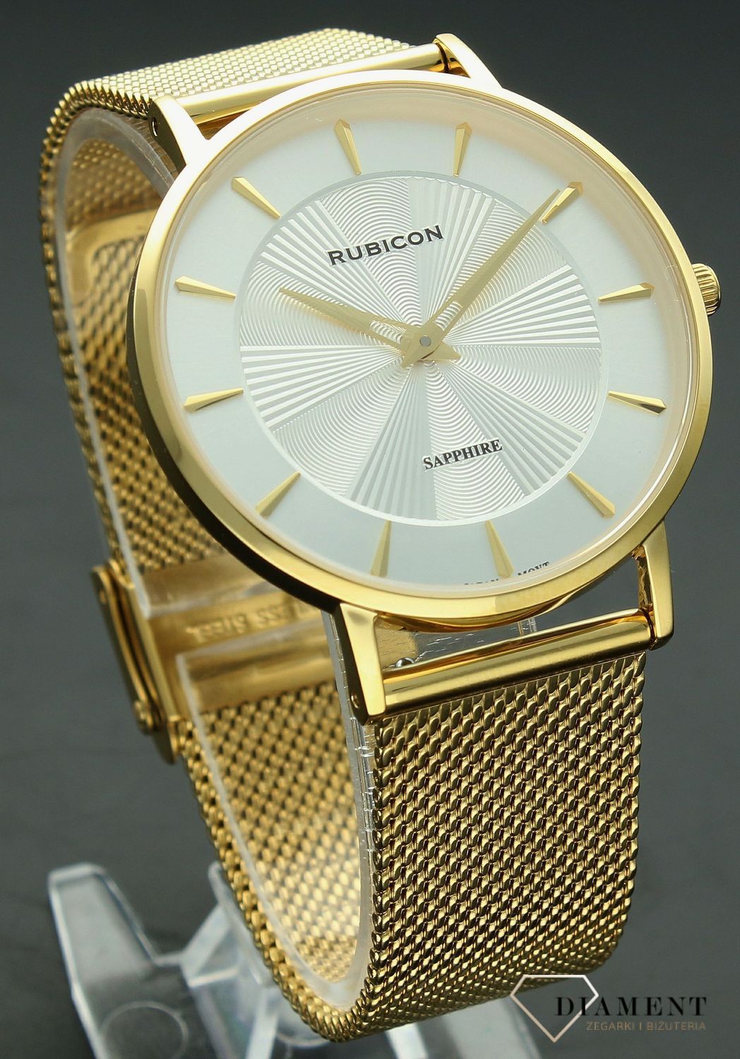 Zegarek damski Rubicon złoty z szafirowym szkłem RNBD76 złoty-srebrny-promienie. Zegarek damski na bransolecie. Zegarek damski Rubicon z indeksami. Zegarek damski biżuteryjny Rubicon. Elegancki zegarek w złotym kolorze na prezent..jpg